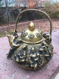 Antique Teapot with The Eight Daoist Immortals