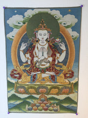 Avalokiteshvara with a Green Halo on Blue Background